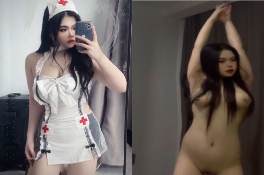 Y tá xinh đẹp với vòng một nảy nở chăm sóc bệnh nhân